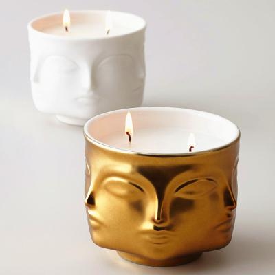 China Modern Wedding Ceramic Buddha Head Face Candle Jars Unique Design Home Decorative Luxury Home Decoration Candle Holder Table For Candle for sale