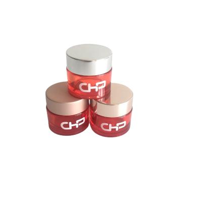 China Cosmetic cosmetic packaging orange petg jars with matte gold lid for sale