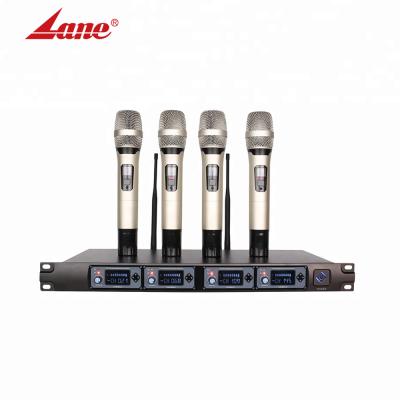 China Professional Handheld Wireless Microphone 4 Channel Dynamic Professional Handheld Karaoke Stage KTV Home MIC 4 MIC for sale