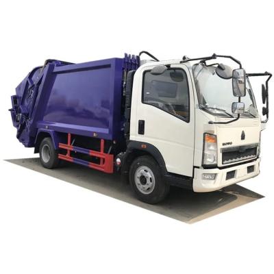 China Hotels 6cbm 8cbm 10cbm HOWO Rear Load Compressor Waste Disposal Collection Truck Demountable Garbage Bin Garbage Truck for sale