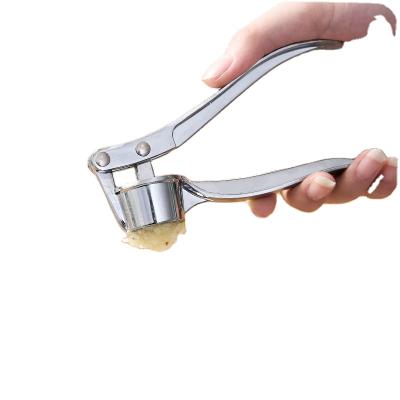 China Sustainable Top Selling Kitchen Instrument Household Garlic Crusher Manual Stainless Steel Hand Held Garlic Press for sale