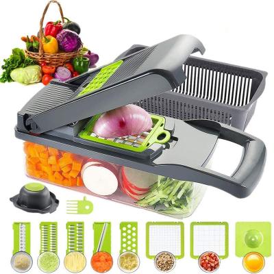 China Viable 12 in 1 Multifunctional Vegetable Manual Plastic Fruit Onion Slicer Potato Peeler Vegetable Cutter Kitchen Cleaver Grater for sale