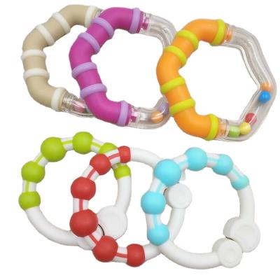 China New Toys (Eco-friendly) PP Model Ring New Calm Baby Gum Pain Baby Teether Rings Plastic Toy Rings for sale