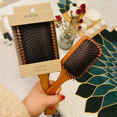 China Waterproof wooden comb hair brush hemu and detangling natural beech hair combs ease main fatigue massage new styles 2021 ready to ship for sale