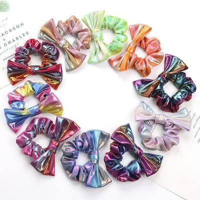 China Hair Accessories Sell Glitter Laser Flame Dovetail Bowknot Hair Tie Children/Adult Leather Wholesale Hair Accessories for sale