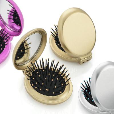 China Custom Logo Wet Pocket Detangle Foldable Mini Folding Hair Brush With Massage Hair Brush Foldable Makeup Mirror For Travel for sale