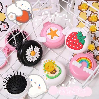 China Cartoon Collapsible Pocket Brush Massage Hair Detangle Mini Folding Hair Brush With Makeup Mirror For Travel for sale