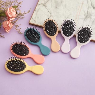 China Multiple Color Fashion Handsome Mini Portable Scalp Massage Air Candy Massager Cushion Comb for Kids and Girl for sale