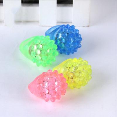 China Plastic Light Ring Toys Uneven LED Finger Lights Ring Party Favor Blinking Jelly Rubber Rings for sale