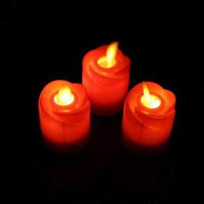 China Decorative Christmas Red Color LED Candle Lights Flameless Led Tea Light Candle For Wedding for sale