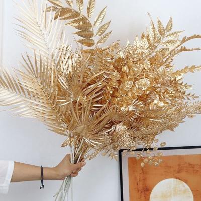 China Wedding Ceremony Decorative Arrangement Art Decor Golden Flower Artificial Flower Arrangement Plastic Flowers New Year for sale