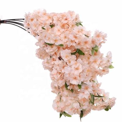 China Art Decor Simulation of cherry blossom branch hotel wedding decoration cherry blossom plastic fakeflower silk rattan for sale