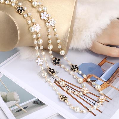 China New Spring 2021 Big Brand Cute Handmade Flower Pearl Necklace Layer Decorated Sweater Chain for sale