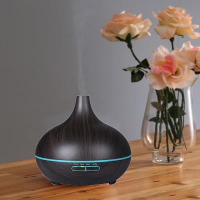 China Newest Household Aromatherapy 550ml Wood Aromatic Essential Oil Purifier 7 Led Color Air Humidifier Aroma Diffuser for sale