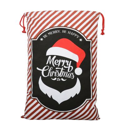 China Christmas 2021 Customized Sublimation Santa Claus Drawstring Large White Burlap Polyester Cartoon Gift Bags White Beige Bags for sale