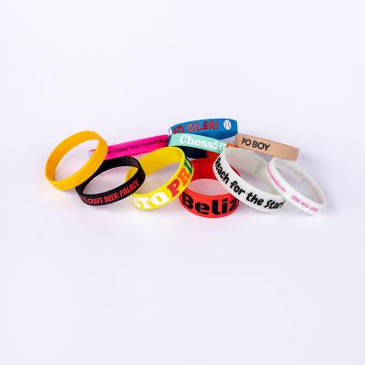 China Each Hot Selling Gift Silicon Bracelets Rubber Wristband With Custom Logo for sale