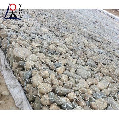 China Cuadro de alambre hexagonal de tejido galvanizado de malla de gabión de jaula de roca pared de contención en venta