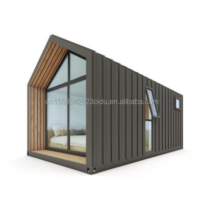 China Modern Triangular Resort Hotel Prefab Container House met een slaapkamer Badkamer Keuken en tuin Kenmerken Sandwich Panel Door Te koop