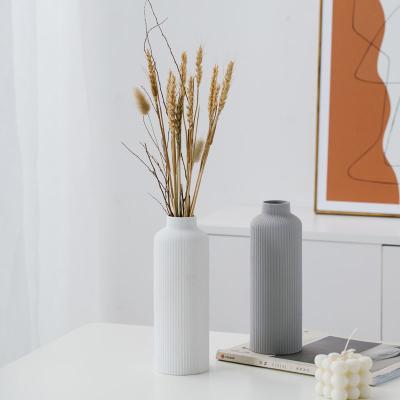 China Nordic Minimalist Matt Modern Tabletop Handmade Clay Vase Striped White Ceramic Flower Vase for Home for sale