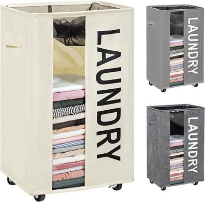 China Large Rolling 90L Home Laundry Basket Laundry Basket Rolls Folding Clothes Hamper With Clear Window Carry Handles for sale