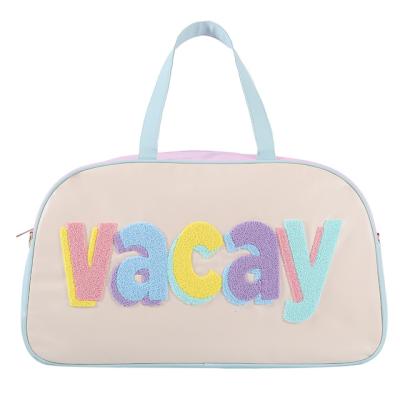 China Fashion Custom vacay travel luggage bags Stitching color embroidery patches Pu leather women yoga bags waterproof travel storage bag for sale