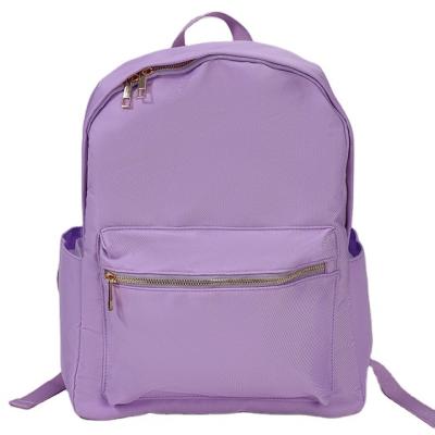 China Waterproof The Fine Quality Nylon products kids Travel backpack waterproof fabric simple schoolbag Zippers Trending Backpacks for sale