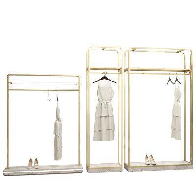 China Morden Clothing Store Gold Clothes Display Rack Clothes Show Ideas Garment Display Rack With LED for sale