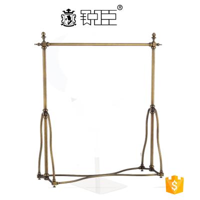 China Removable Customized Brass Clothing Display Rack For Boutique Store for sale