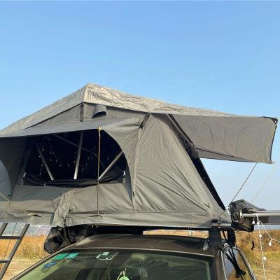 China Diagonal Tying Type Canvas Top Roof Camper Sunday Camping Roof Top Tent for sale