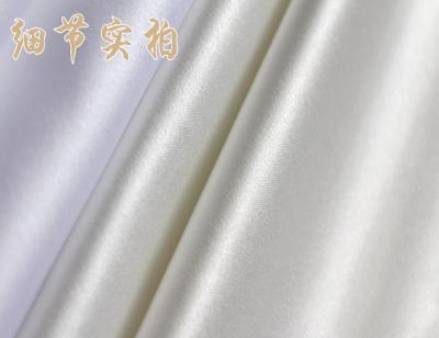 China Sustainable High End Taiwan Imported Satin 395 Solid Color Wedding Dress Apparel Fabric for sale