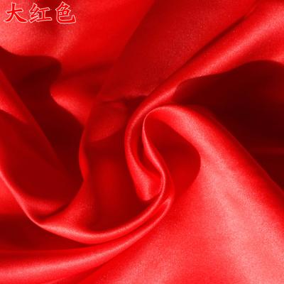 China Sustainable Small Bright Red Wedding Satin Thick No Stretch Wedding Dress Fabric for sale