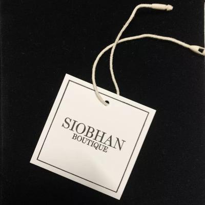 China Eco-friendly Custom Wholesale Garment Swing Logo Hang Tags Label Embossed Clothing Paper Hang Tag With Brand Logo for sale