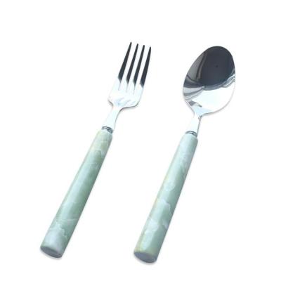 China Ceramic Silver Handle Good Quality Sustainable Flora Products Edible Cutlery With Fruit Fork And Spoon for sale