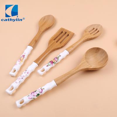 China Sustainable Ceramic Handle Colored Kitchen Utensils Cooking Tools Wooden Kitchen Utensils Set for sale