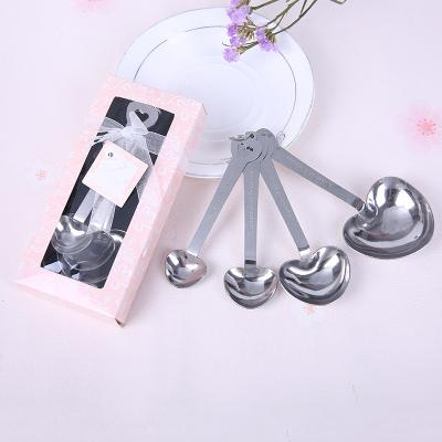 China Solid Metal Stainless Steel Heart Shape Sliver Stocked Small Scoop Hanging Narrow Dosers Set for sale