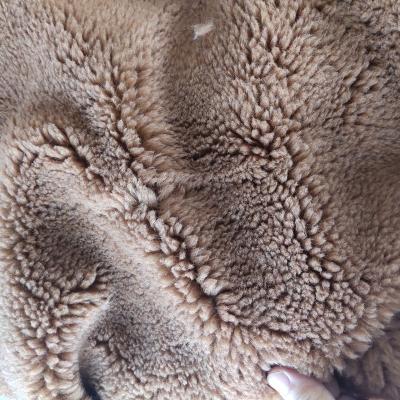 China Garment 100% Polyester Sherpa Lambskin Fleece Faux Fur Fabric for sale