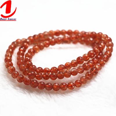 China Cute Red Pink Images 6mm 4mm Nominal Lucky Charm 7 Chakra Stretch Strawberry Beaded Elastic Bracelet for sale