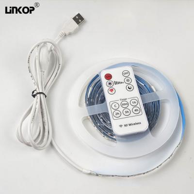 China 2835 Lâmpada LED monocolor Lâmpada linear autoadhesiva com controlador sem fio e lâmpada USB de potência 4-8W/M à venda