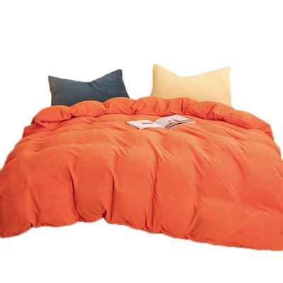 China Reactive Colorblock Printing And Dyeing 4pcs Plush Duvet Cover Set Home Decor Coral Fleece Designer Bedding Set Warm Winter Orange Bedding for sale