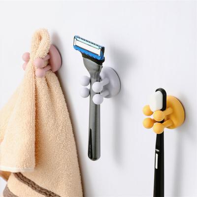 China Modern Hook 4 Leg Hook Self Adhesive Plug Cable Wall Hook Kitchen Bathroom Organizer Silicone Towel Hook Razor Holder for sale