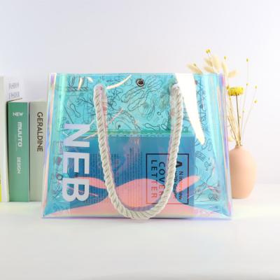 China Custom Clear Logo Fashion Laser Handle Shoulder Bag Glitter Tote Bag PVC Handled Clear Shopping Holographic Bag for sale