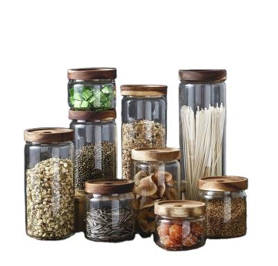 China Freshness Preservation Customized Wooden Lid Glass Sealed Jar Kitchen Storage Mason Jar Bottle Food Container for sale