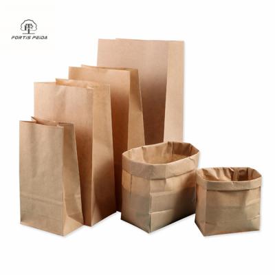 China Materials Manufacturers Stain Kraft Paper Bag Cardboard Recycled White Hand Held Wholesale Clothing Store Packaging Gift Bag Lo Printed for sale