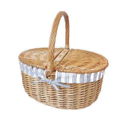 China Sustainable Handmade Wholesale Willow Storage Baskets Laundry Cloth Picnic Wicker Basket With Liner for sale