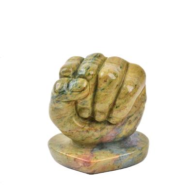 China China Natural Sea Jasper Chunks Decorative Hand Carved Healing Crystal Fist for sale