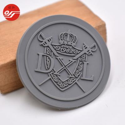 China Viable Wholesale Custom Rubber Round Patch Logo For Apparel for sale