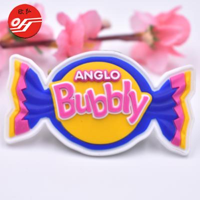 China Sustainable Fashion Design Embossed Custom Logo PVC Rubber Badge For Garment for sale