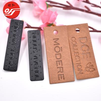 China Viable Classic Design Custom Laser Cut Debossed Name Faux Leather Patch For Garments for sale