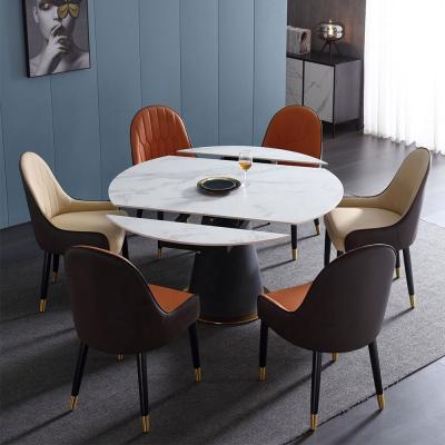 China Metal Base Marble Dining Table and Chairs Durable Luxury Modern Extendable Round Dining Table for sale