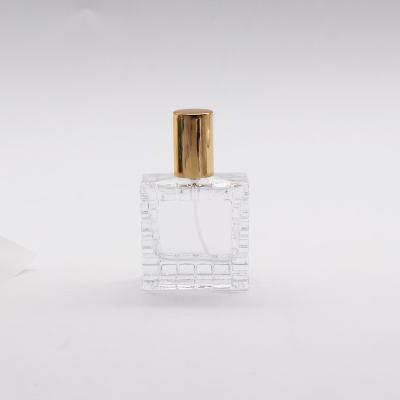 China Cosmetic Custom Pattern Transparent Square Arabic Perfume Bottles 30 Ml Glass Spray Bottle for sale